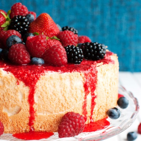 Perfect Angel Food Cake with Raspberry Sauce and Berries