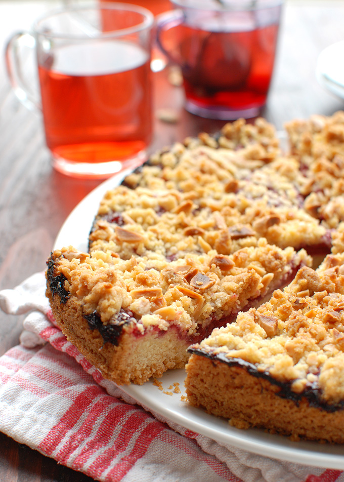 Cherry Cookie Crumb Cake - a buttery cookie-like crust, a dark cherry filling and almond streusel. Delicious! | thetoughcookie.com