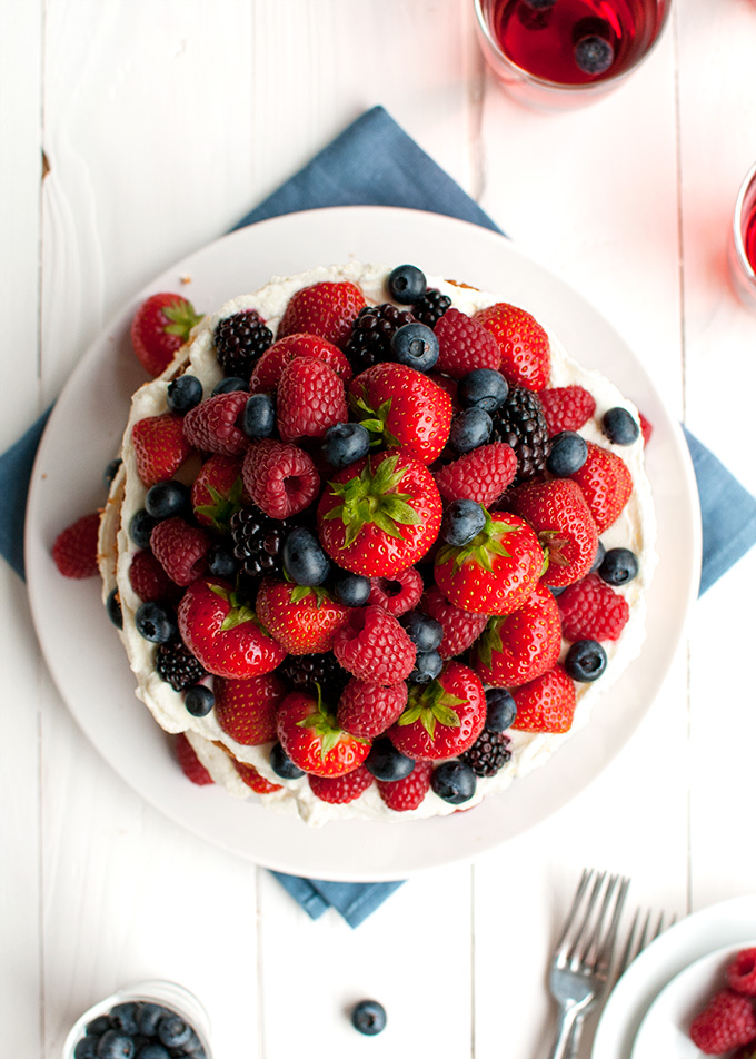 Forest Fruit Cake with Stabilized Whipped Cream Frosting - the whipped cream frosting is light and fluffy and creamy but holds it shape for days! | thetoughcookie.com