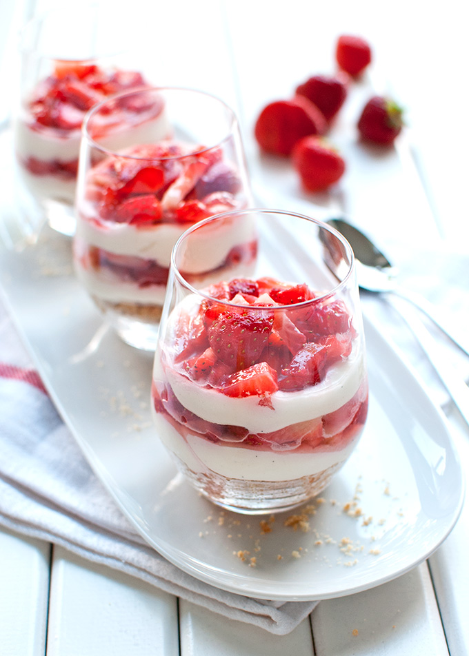 No-Bake Vanilla Strawberry Cheesecakes - These layered individual cheesecakes are super cute and taste amazing! | thetoughcookie.com