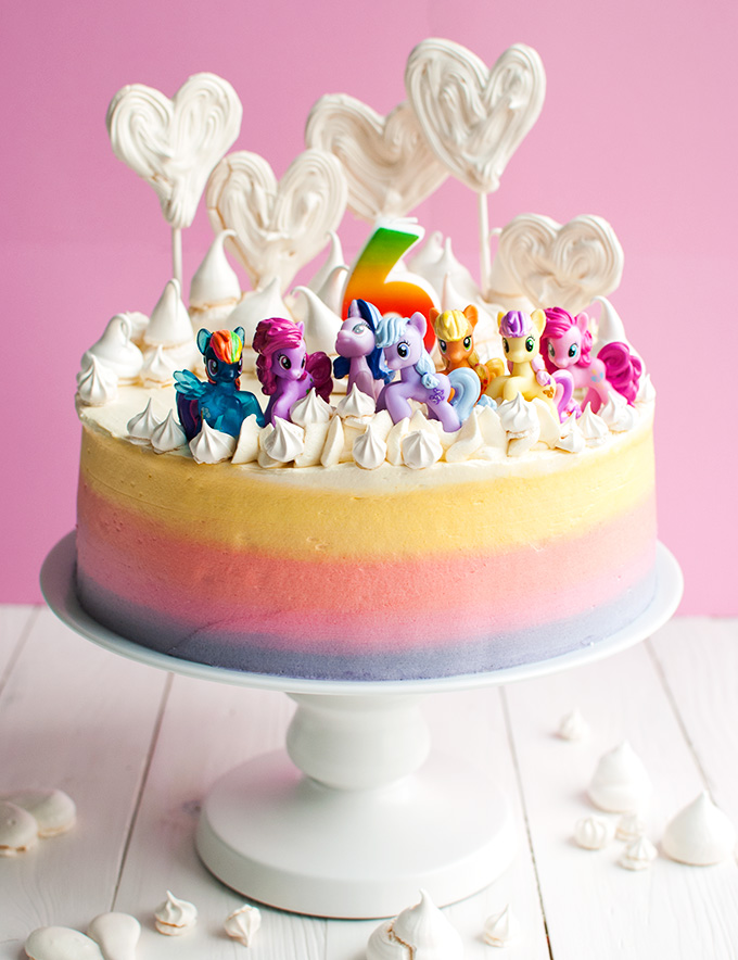 Super Cute My Little Pony Cake - This cake with My Little Pony figures and a rainbow is pretty easy to make at home compared to most My Little Pony cakes out there, but kids love it nonetheless! | thetoughcookie.com