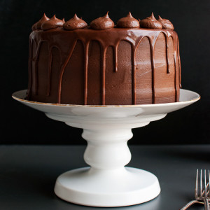 Mock Version of Proof Bakery's Chocolate Espresso Cake - Coffee soaked chocolate cake layers filled with French coffee buttercream and dark chocolate crémeux frosting, finished with a bittersweet chocolate glaze. Like coffee and chocolate? Make this!| thetoughcookie.com