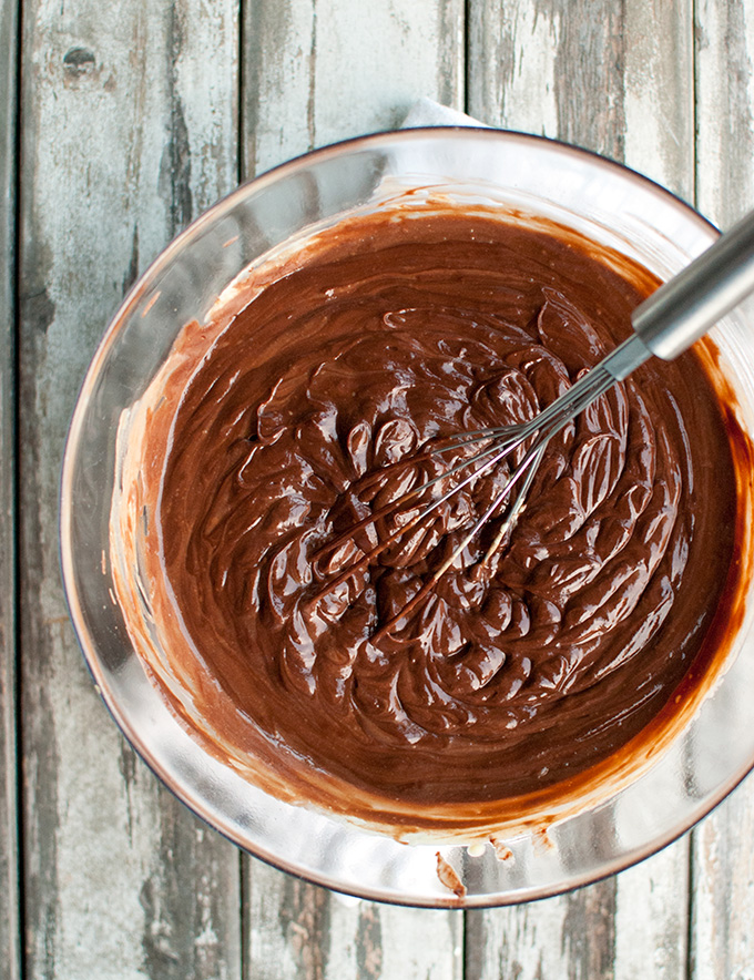 Dark Chocolate Crémeux, or the BEST chocolate frosting ever! It's super smooth, incredibly creamy and deliciously fudgy. And it has an intense chocolate flavor! | thetoughcookie.com